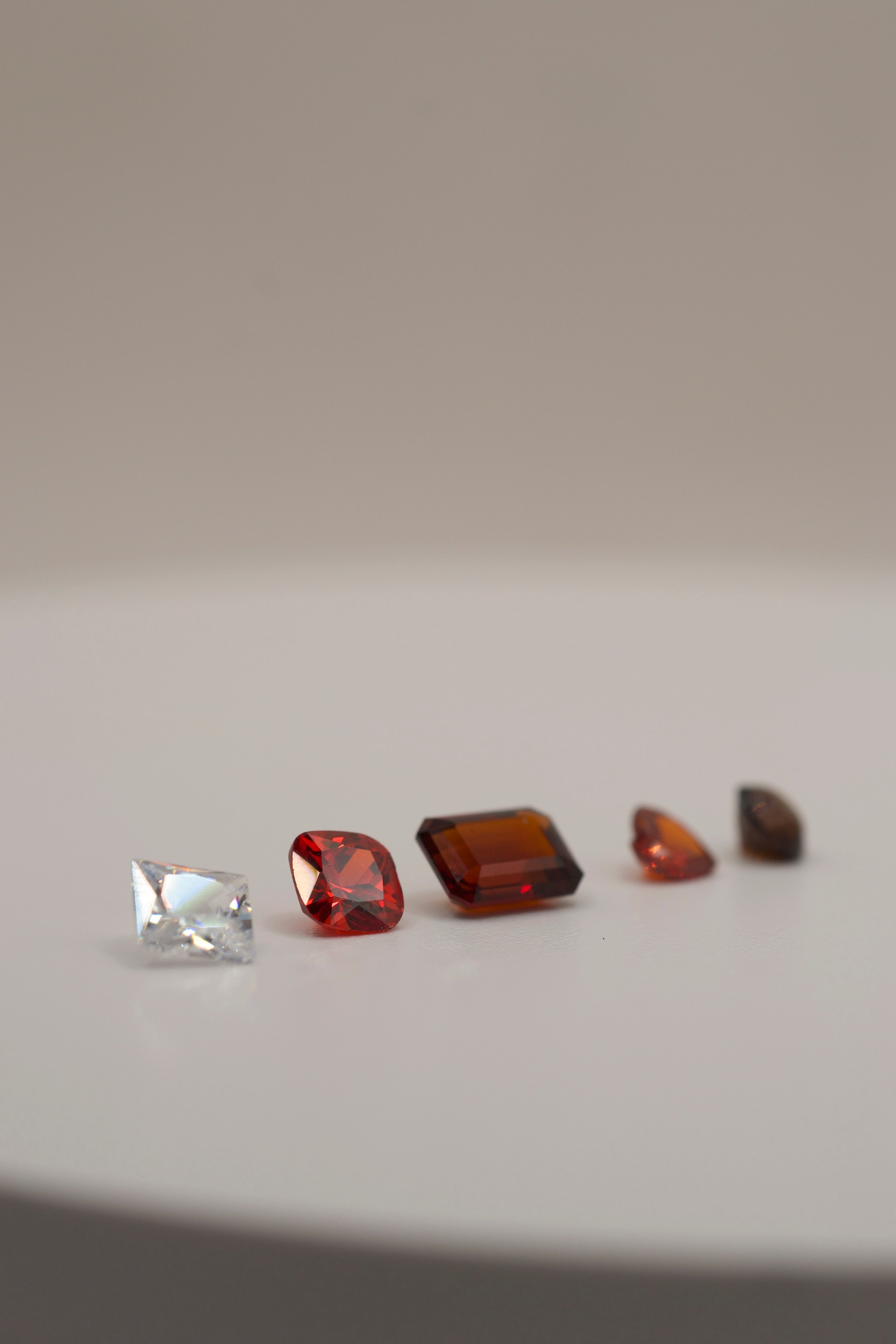 Five gemstones in different cuts and colours for lost wax jewellery designs.
