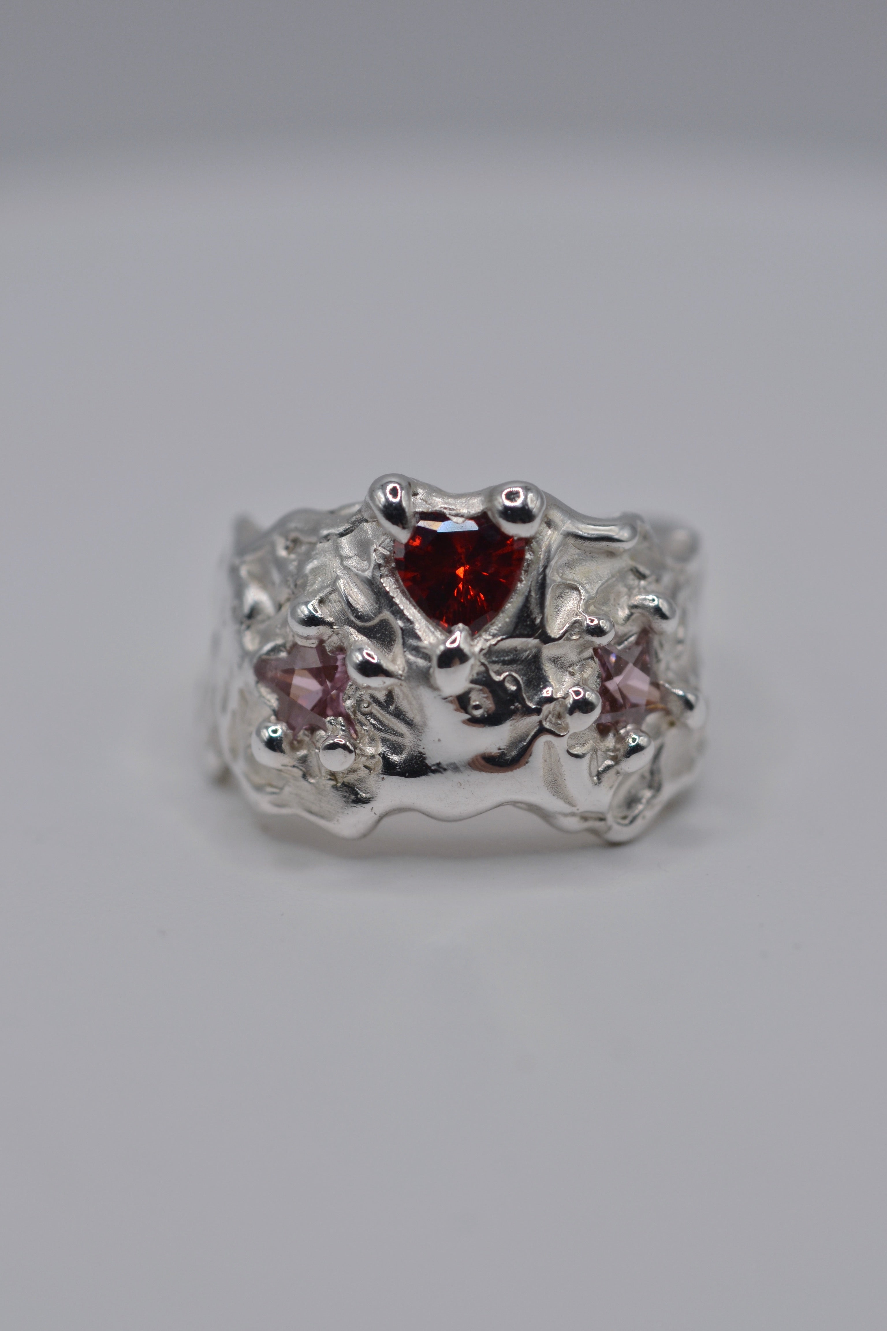 Organic sterling silver alternative engagement ring handmade using lost wax casting. Unique ring with molten sculptural detail. Metal Bones Jewellery.