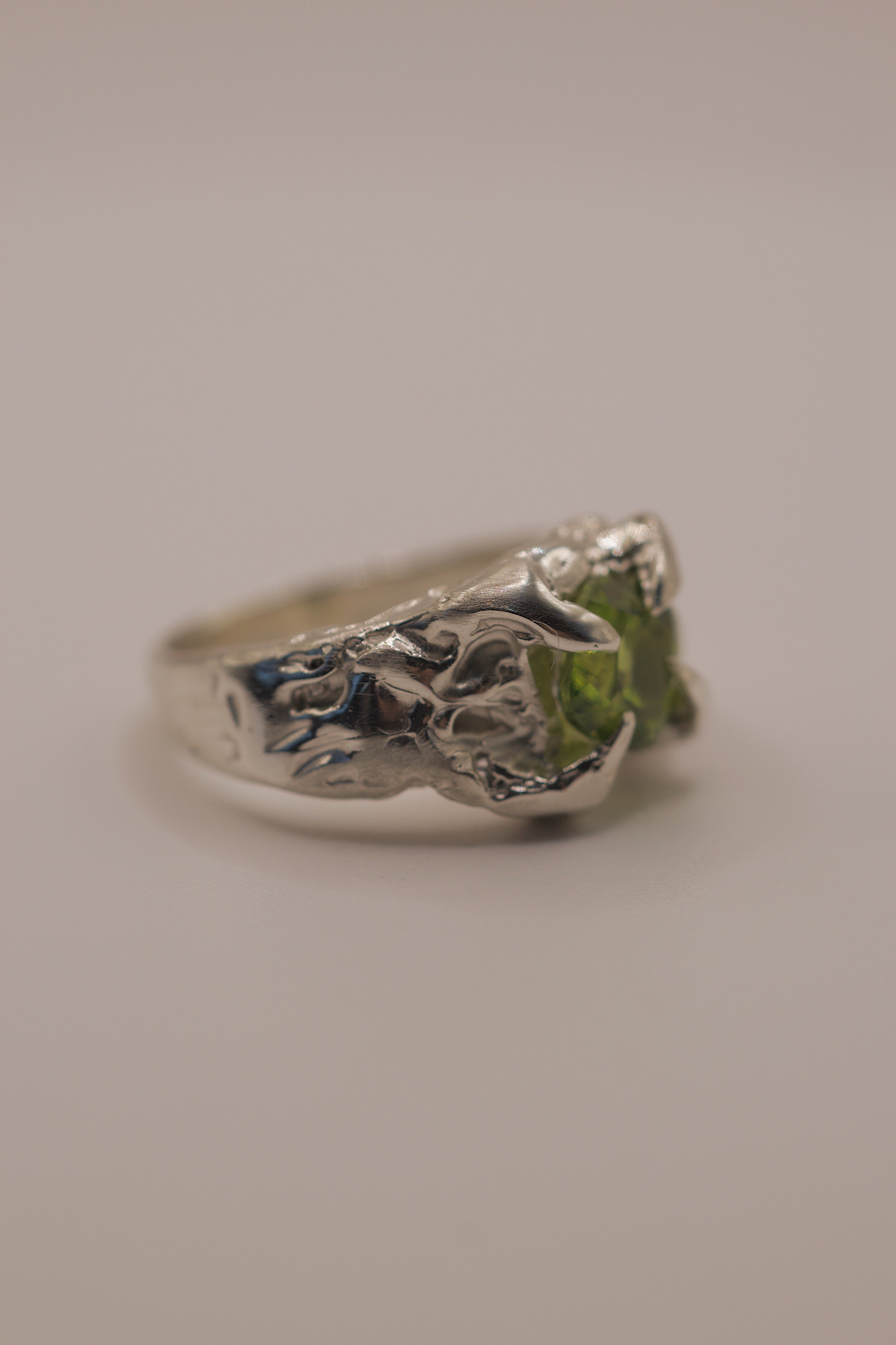 Side angle of the Fern Ring showing organic textured recycled sterling silver band with dimensional shoulder detail handmade using lost wax casting