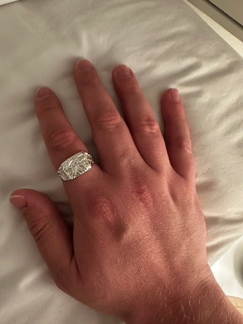 Customer wearing handmade Metal Bones Jewellery silver ring, lost wax cast