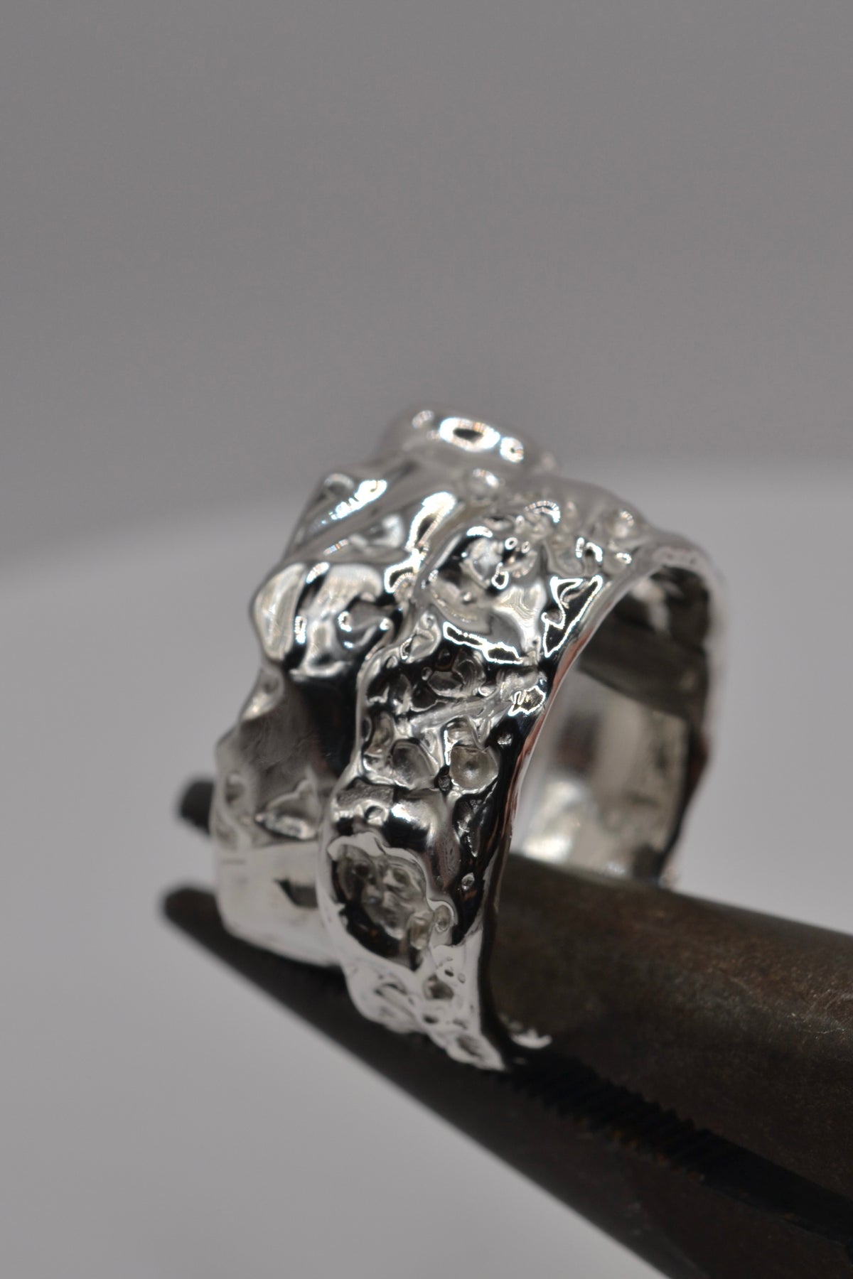 two rings with organic molten texture carved from wax at an in person ring making class with cassandra djodan from metal bones jewellery on the sunshine coast