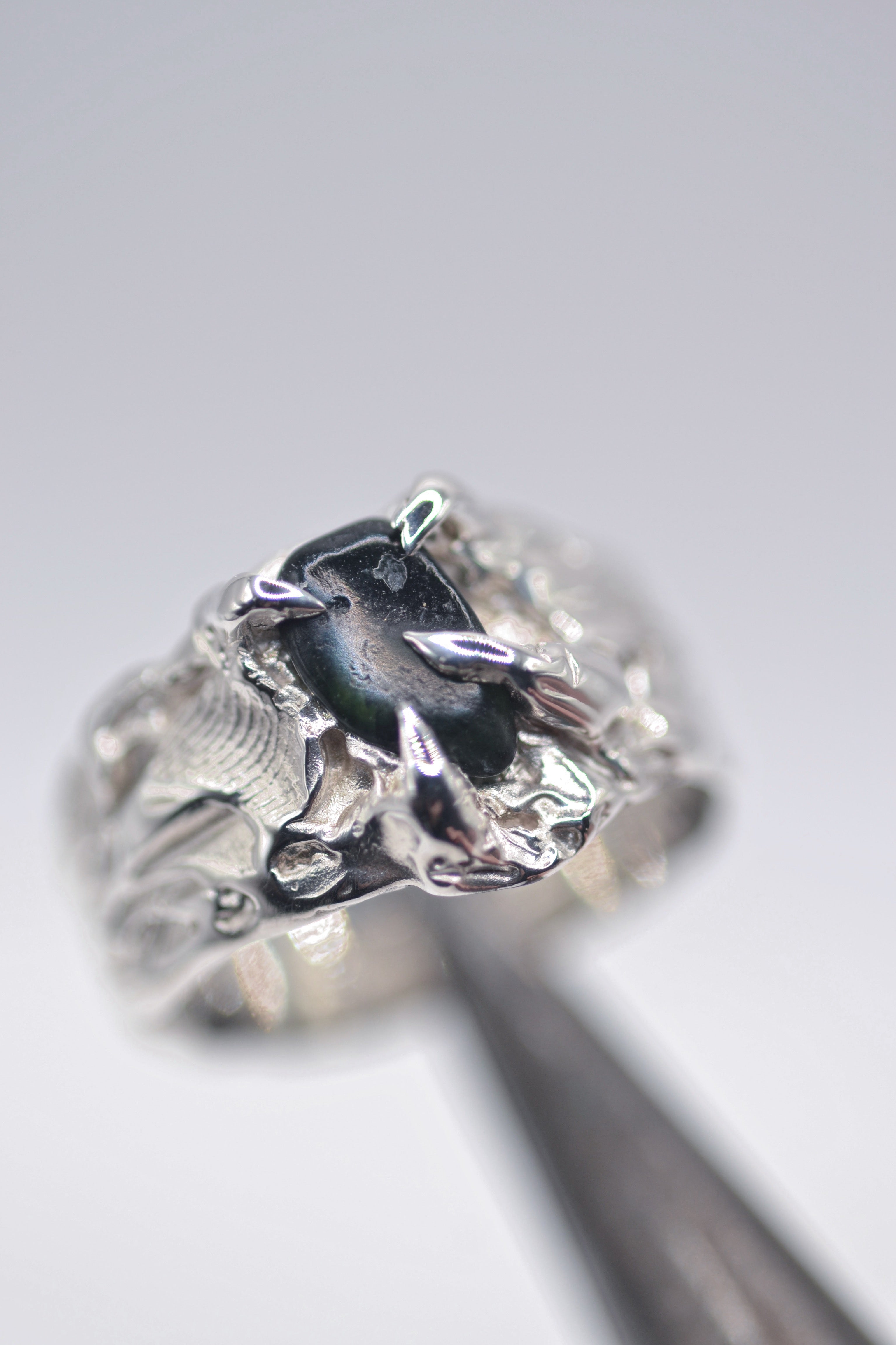 Another angle of the handmade Rattlesnake Ring showing organic sculptural sterling silver detail lost wax cast using the wax carving technique