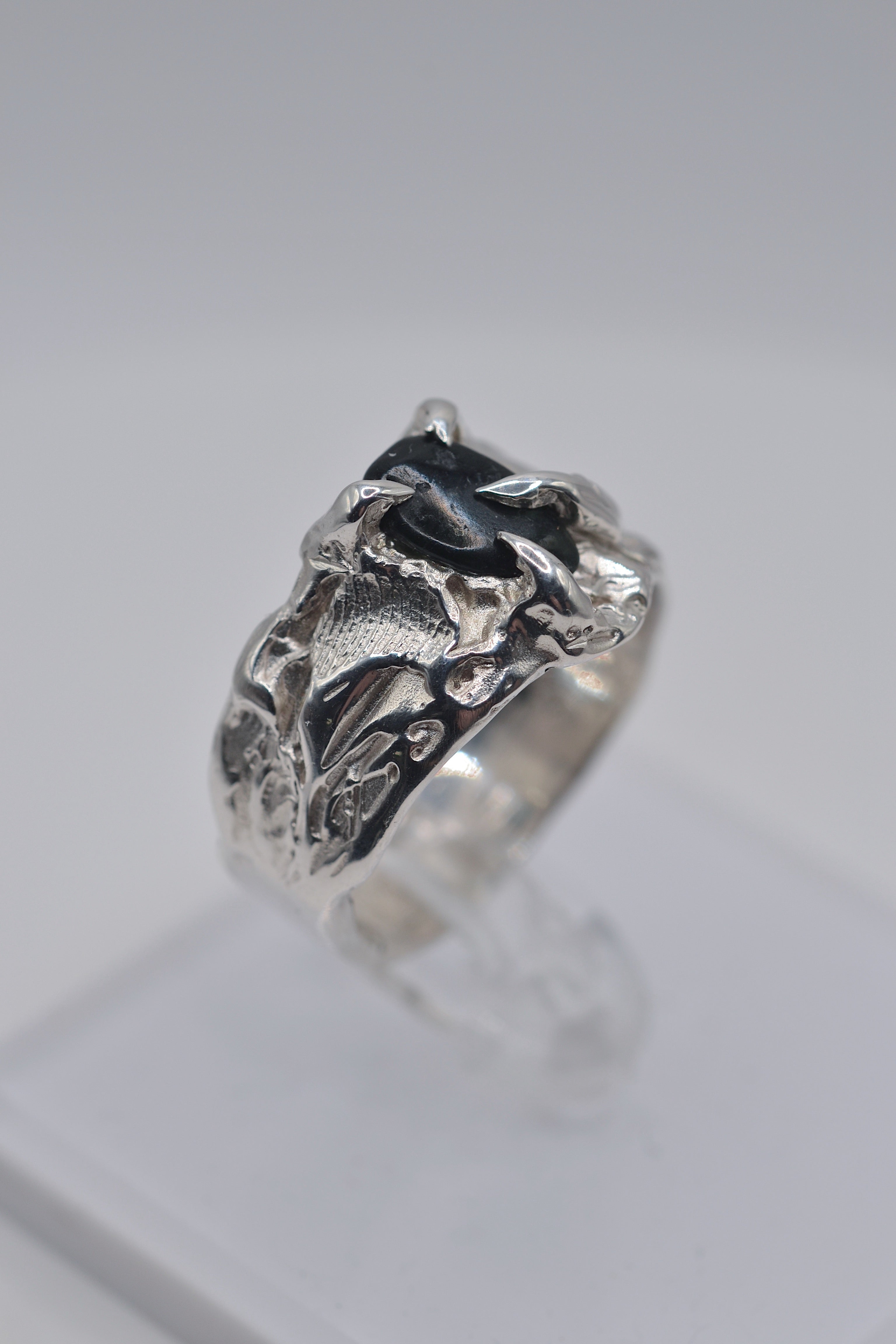 Front view of the handmade lost wax cast sterling silver Rattlesnake Ring showing organic sculptural detail and alternative ring design