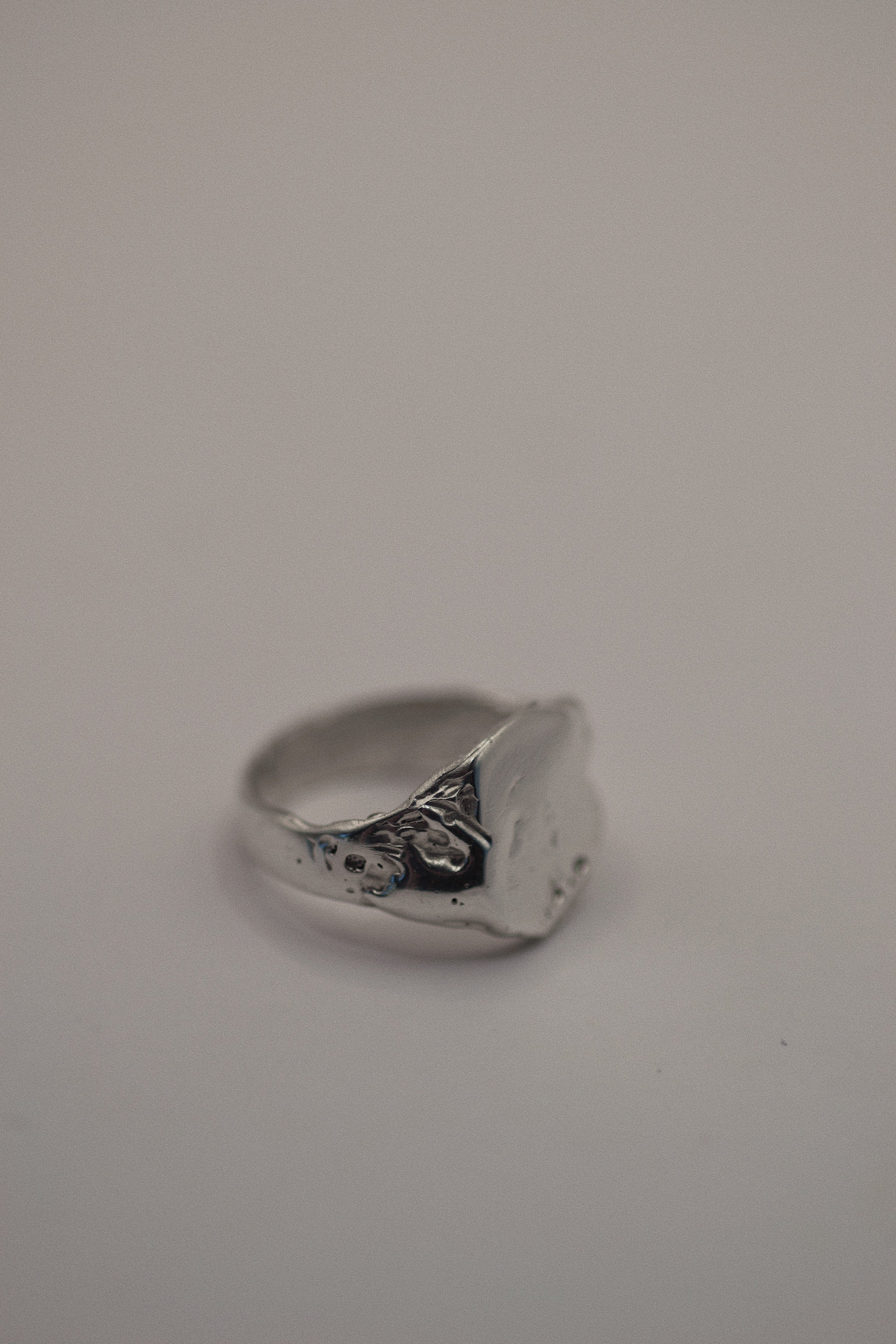 Close up of the Raw Ring showing heavily textured dimensional sterling silver surface handmade using the lost wax casting technique