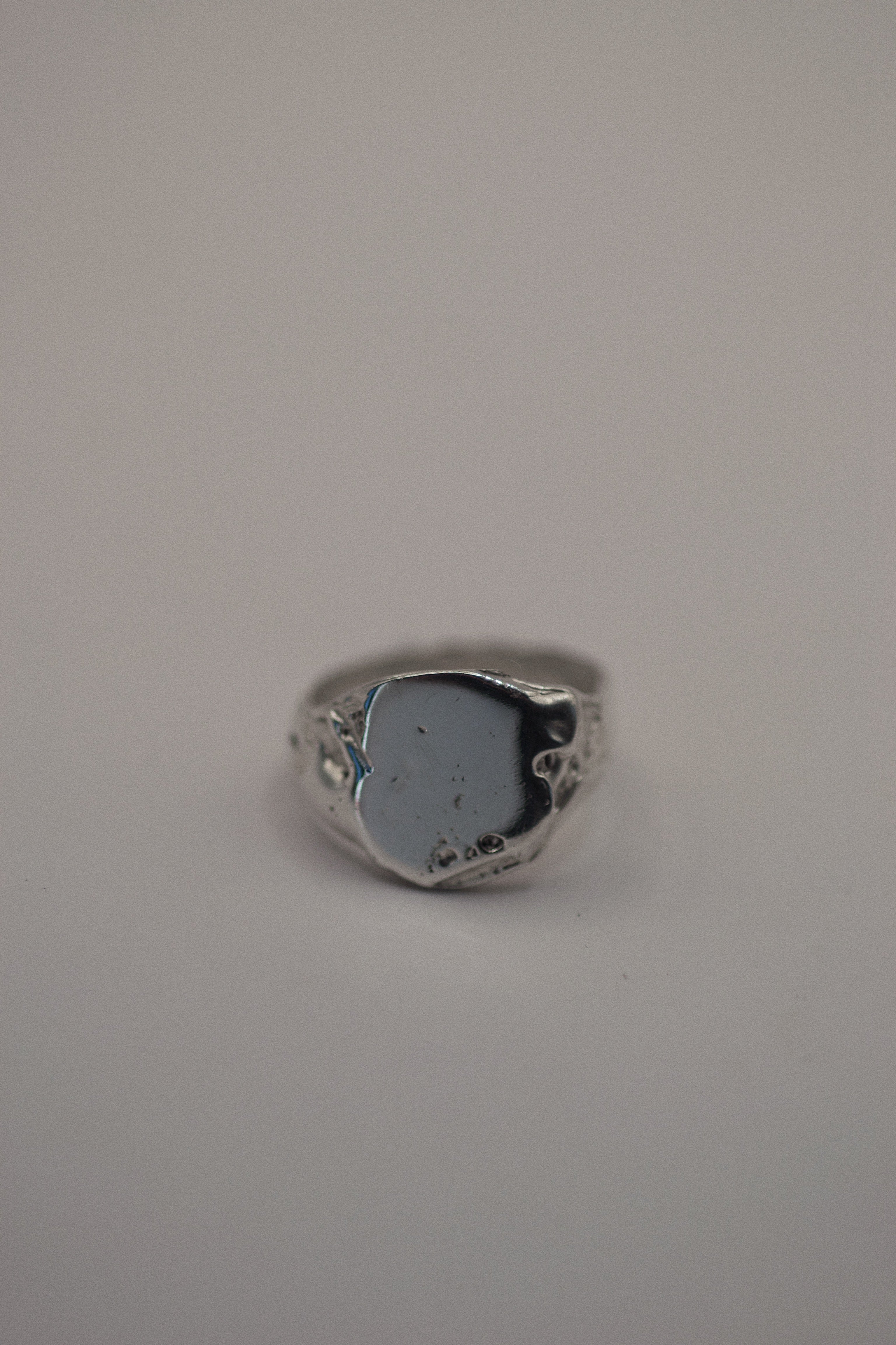Sculptural alternative silver signet ring Raw design lost wax cast in recycled sterling silver with heavily textured dimensional surface