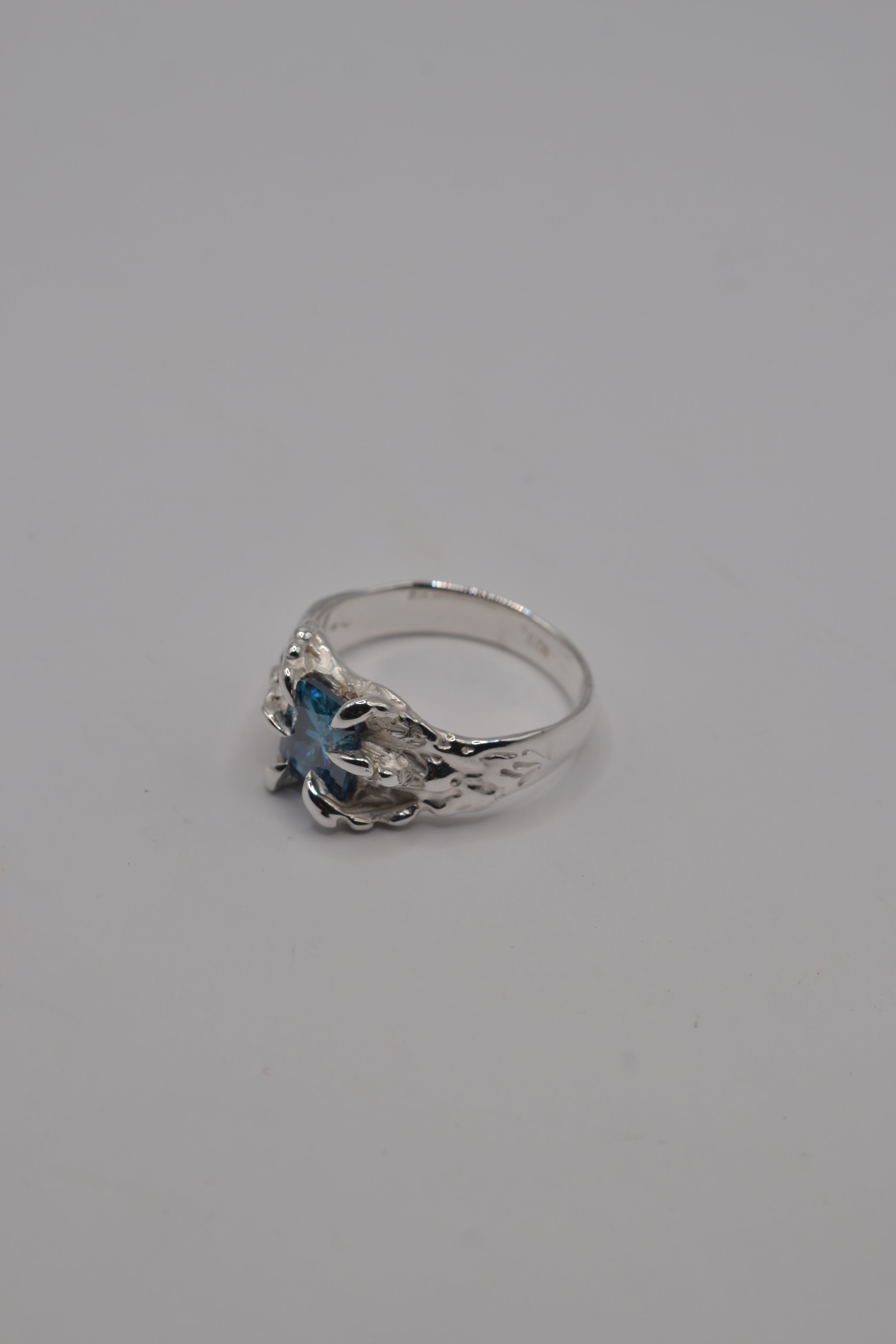 Lost wax cast recycled sterling silver Starburst Ring with blue moissanite and organic molten claw setting handmade alternative jewellery