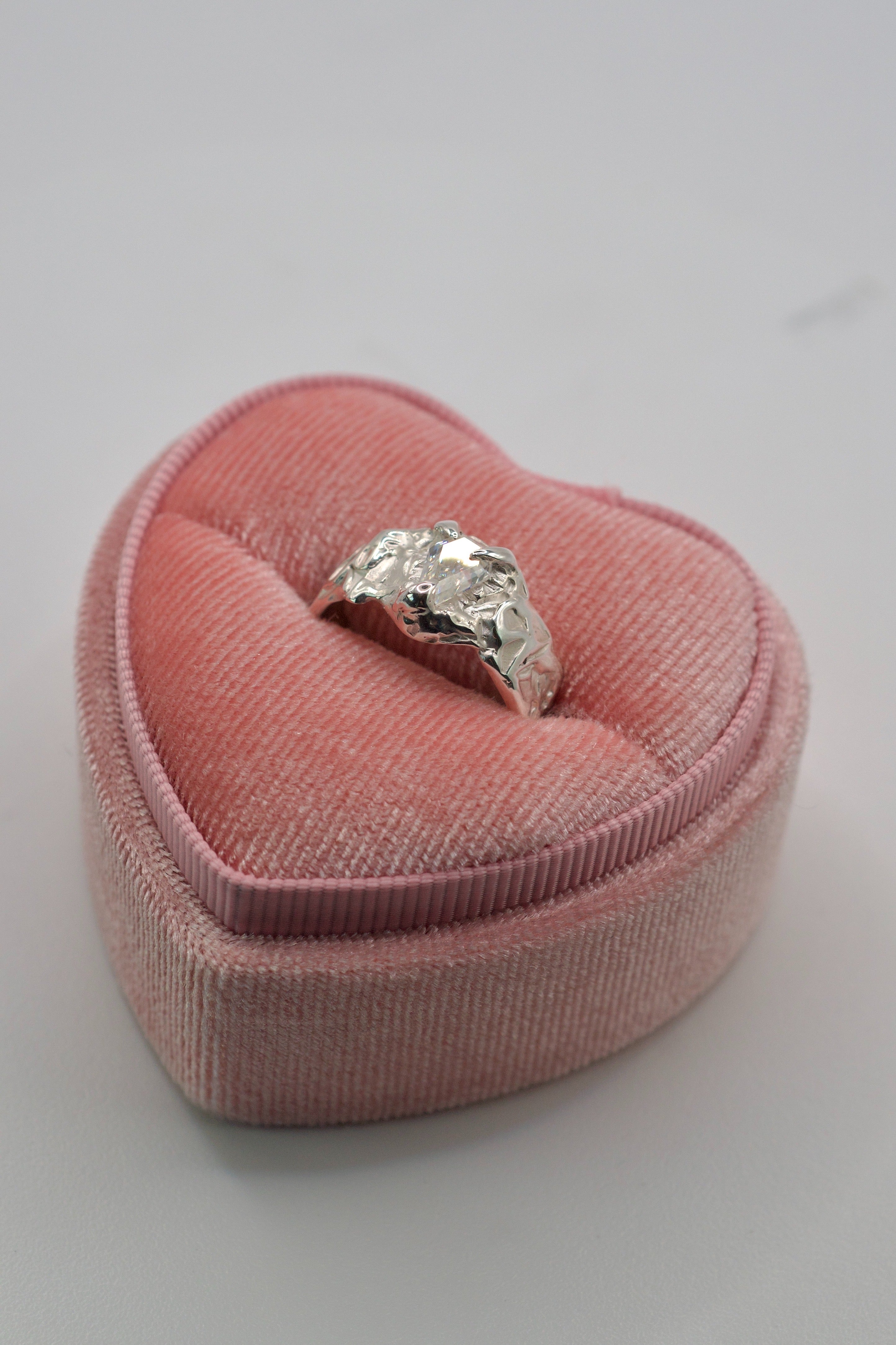 molten sterling silver ring handmade with lost wax technique, coffin shape moissanite in pink heart velvet box