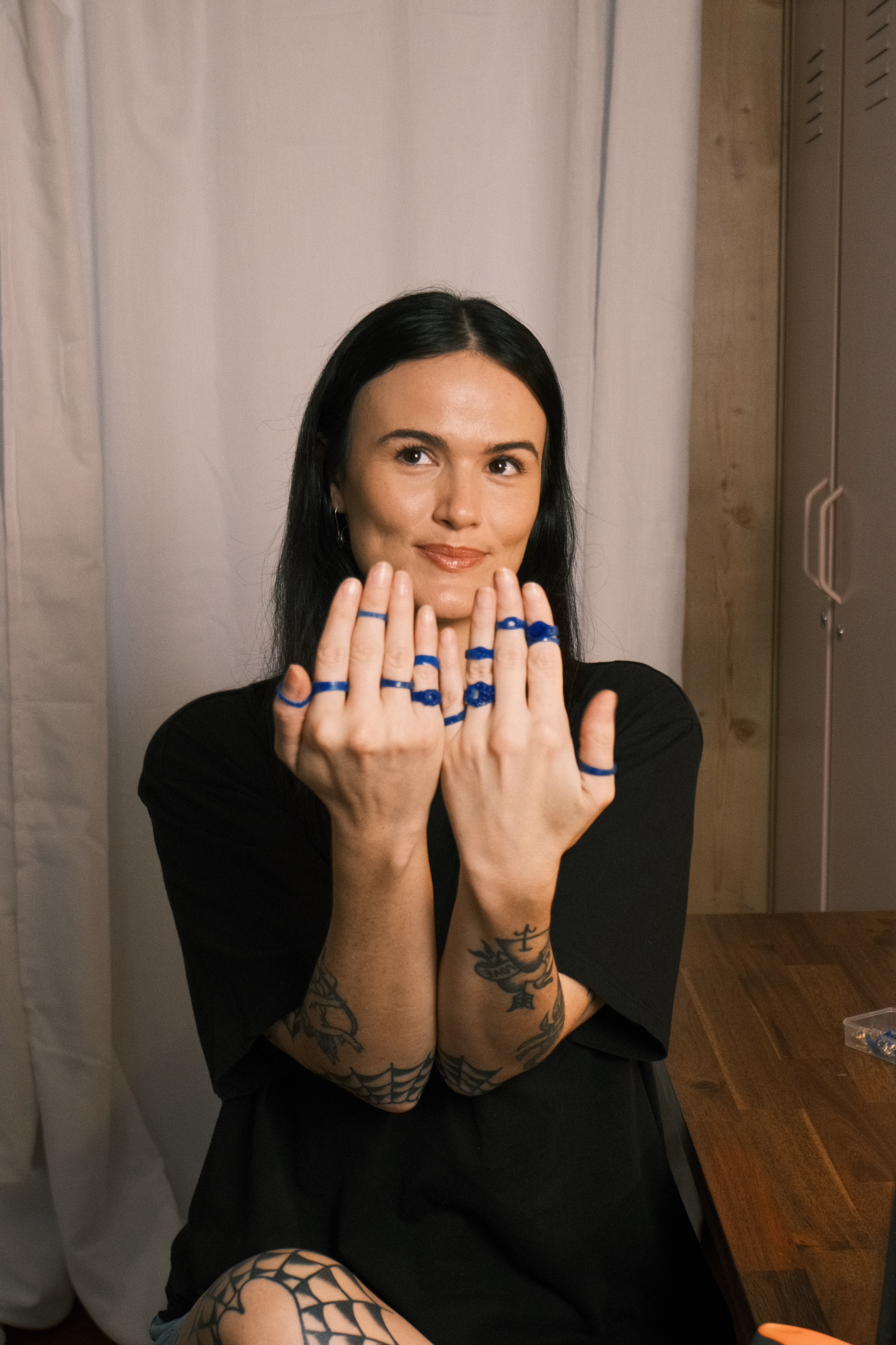 Jewellery maker showing handmade wax rings created with the lost wax casting process
