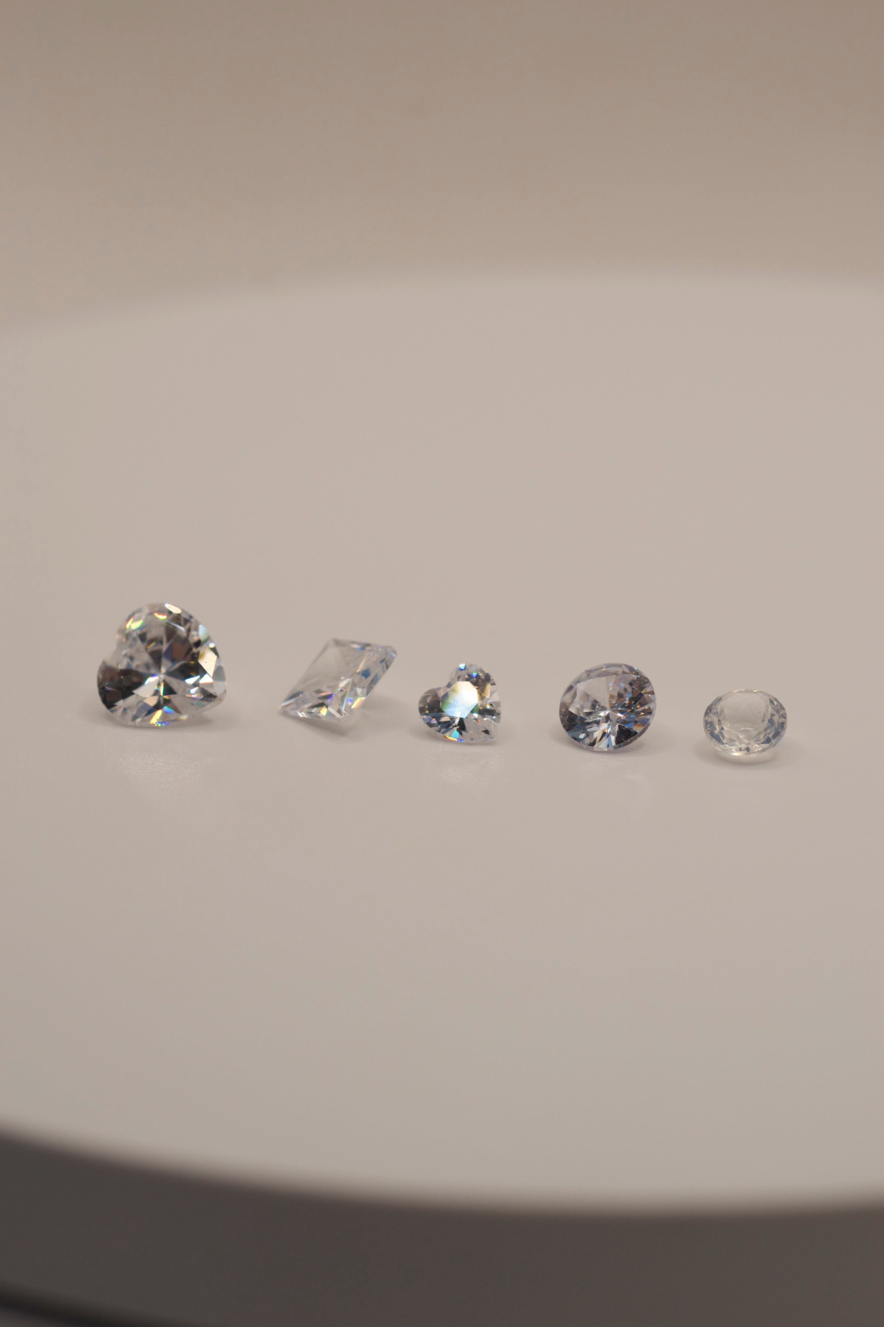 lost wax jewellery stones, gemstones for casting in place, heat safe gemstones, round lab sapphire, heart cut cz gemstone, white opal nano crystal, cz princess cut gem, jewellery making supplies, casting gemstones pack, stones for lost wax designs.