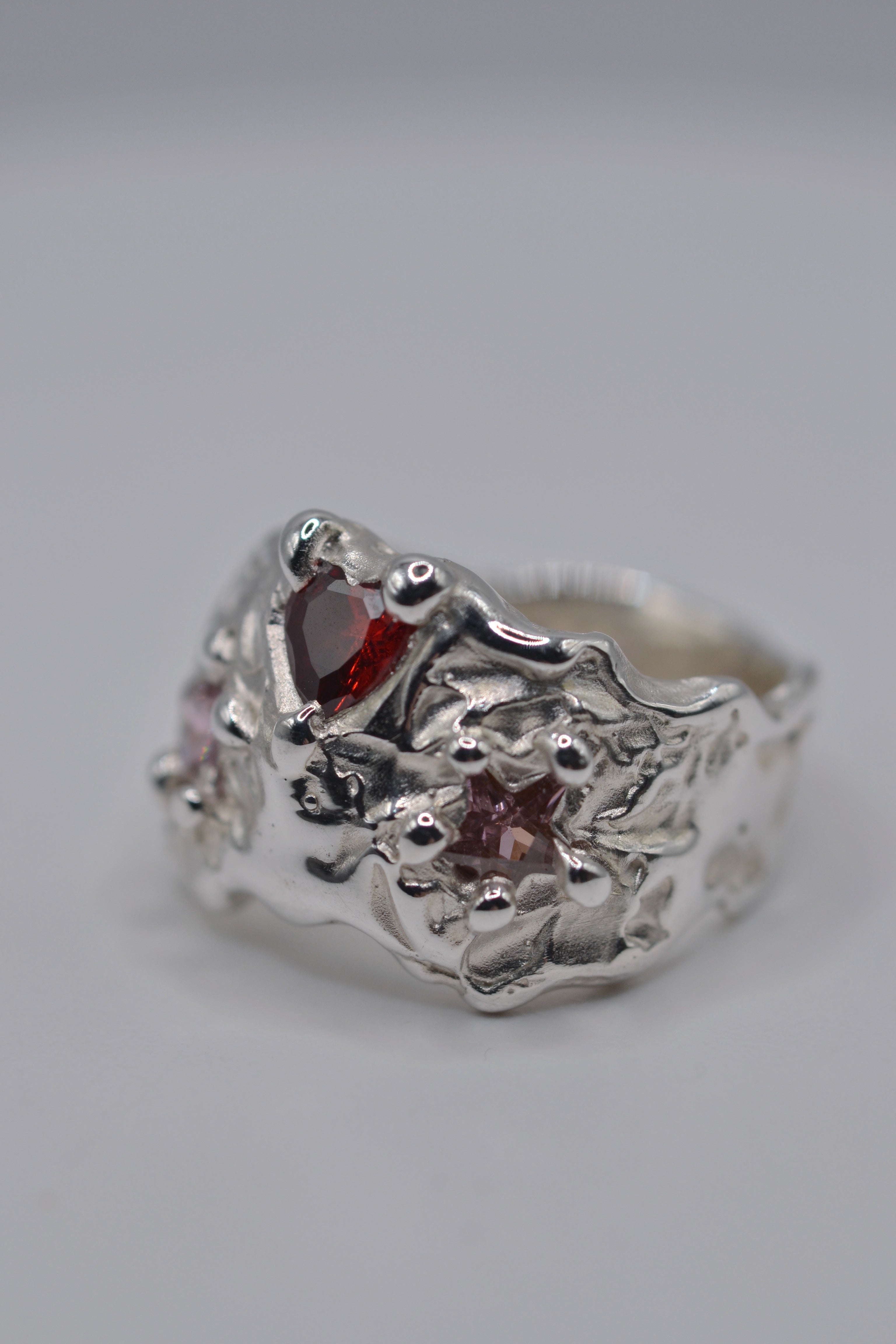 Unique sterling silver ring handmade using lost wax casting. Organic molten texture, cosmic cowgirl aesthetic. Metal Bones Jewellery.