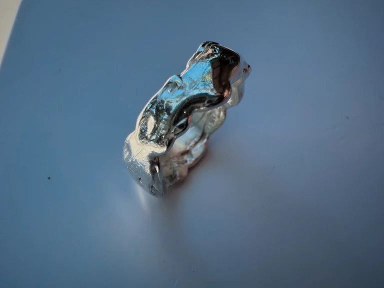 Organic textured silver ring, molten metal fluid style. Boho style with a touch of minimalist. Hand carved from lost wax.