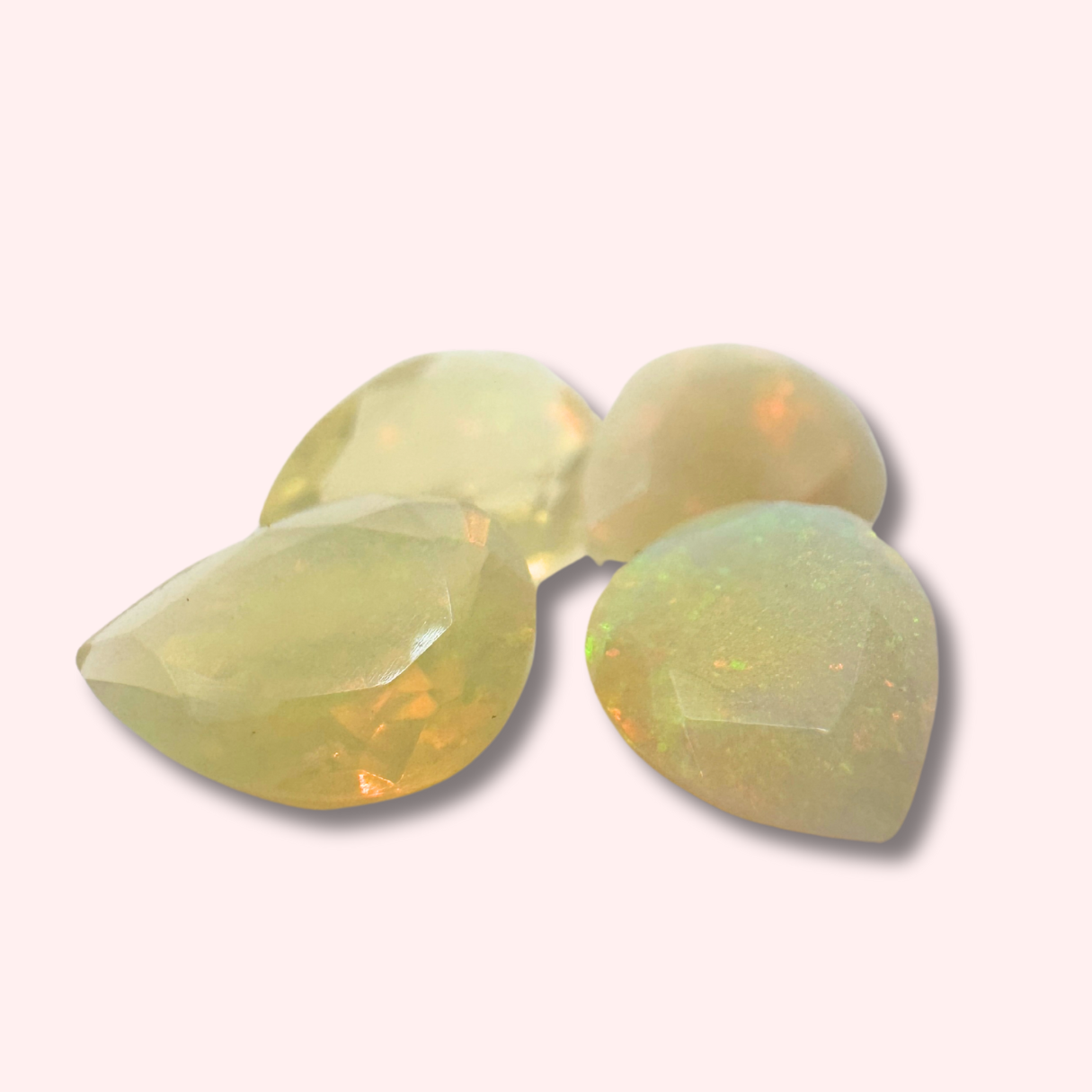 Natural Ethiopian Opal pear-shaped gemstone with a vibrant play of color, ideal for unique lost wax casting jewelry designs
