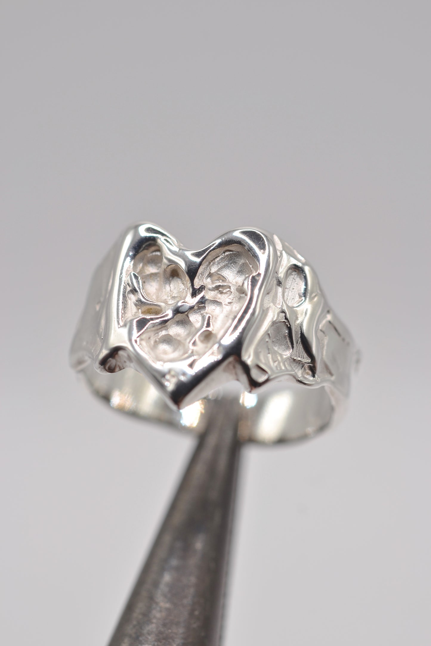 Organic lost wax cast ring in sterling silver with sculptural molten heart design, handmade alternative jewellery