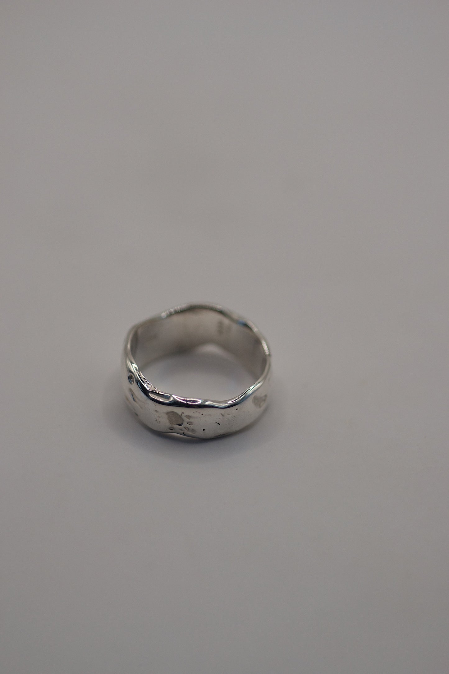 Organic cratered texture ring in recycled sterling silver, cast from hand-sculpted wax