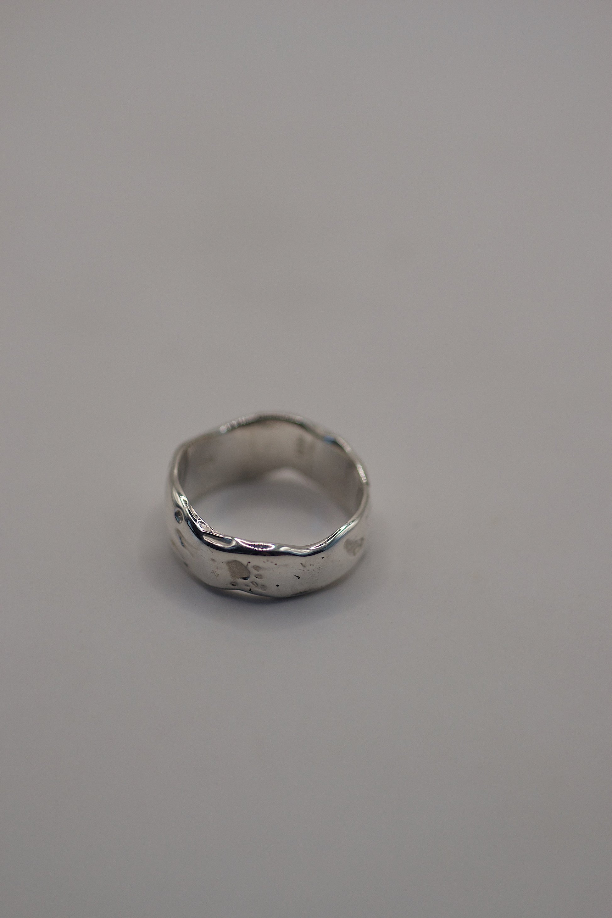  Organic cratered texture ring in recycled sterling silver, cast from hand-sculpted wax