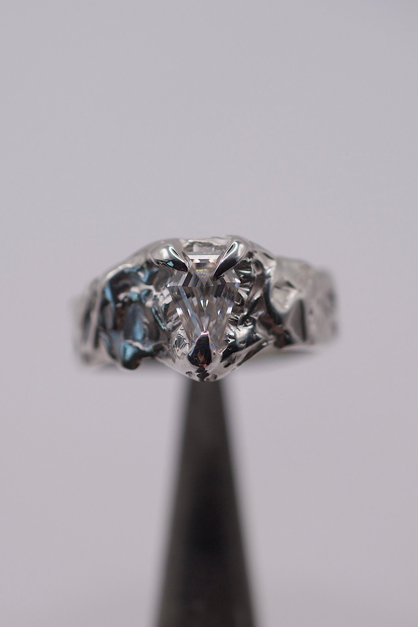 Organic handmade sterling silver ring with textured band and coffin shape white moissanite