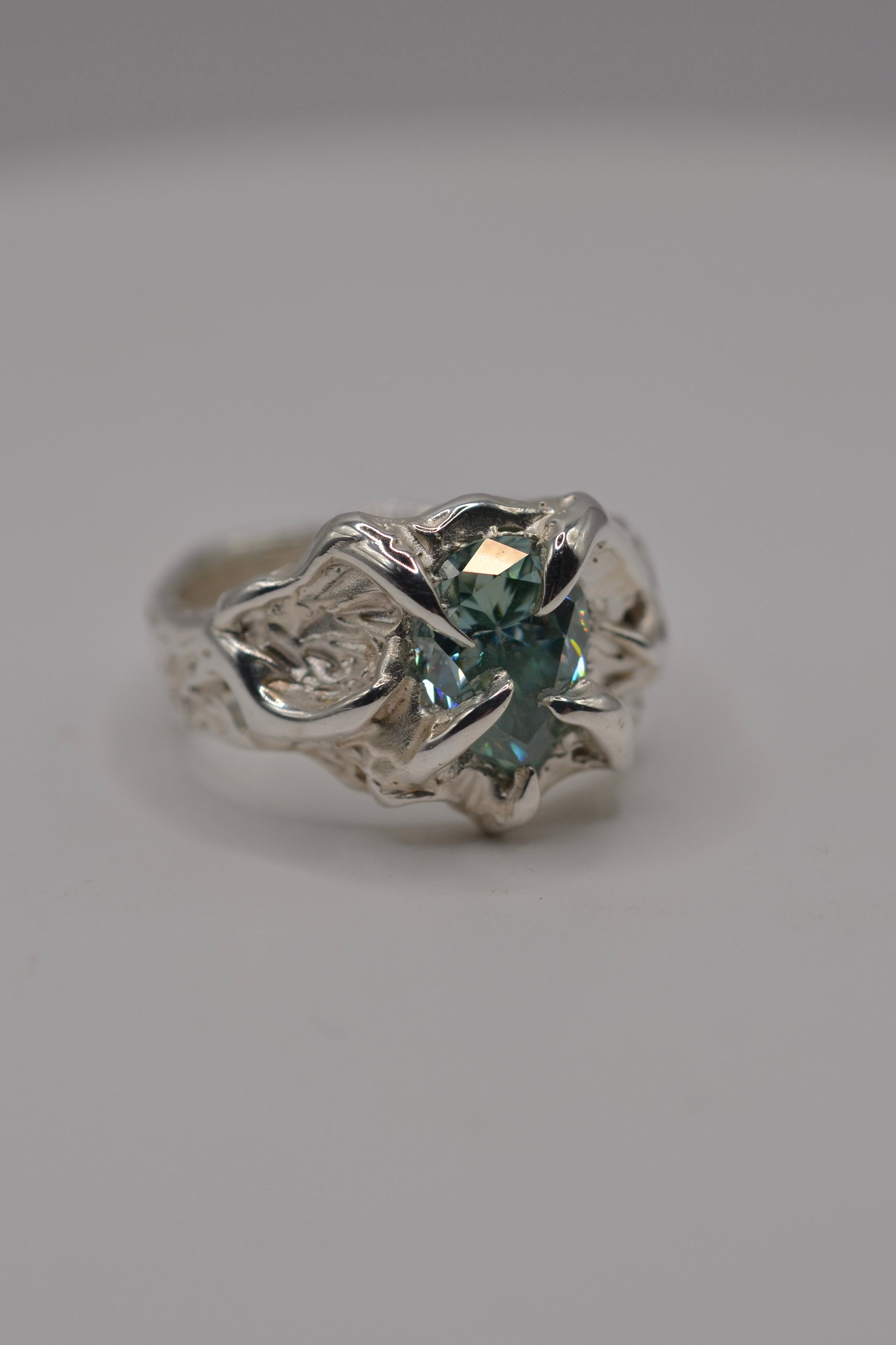 Angled view of the Wrangler. Organic handmade silver ring sculpted using wax carving and lost wax casting. Unique, alternative, one of a kind. Metal Bones Jewellery.