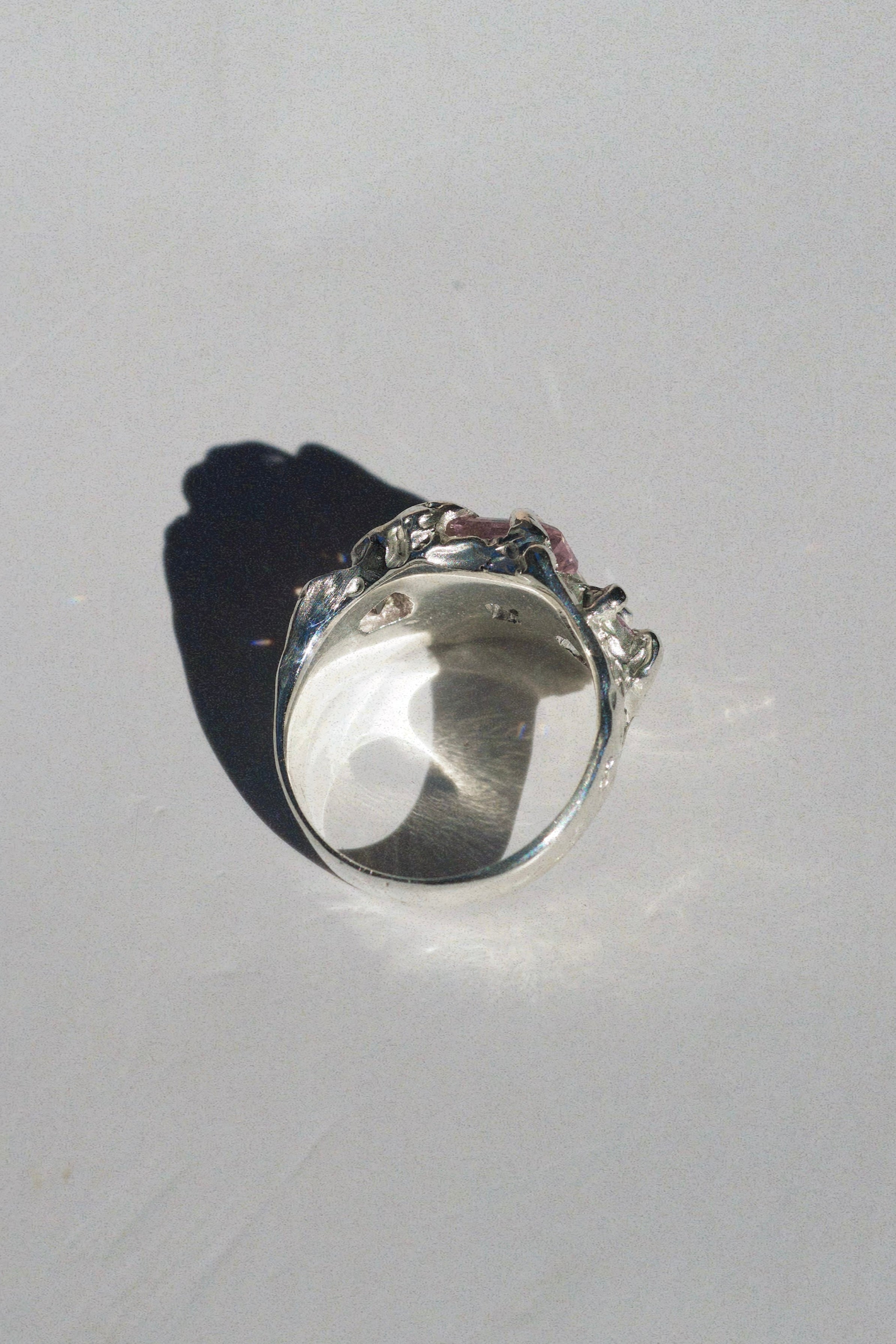 Side view of the Blossom Ring showing textured recycled sterling silver band with organic molten leaf detail handmade using lost wax technique