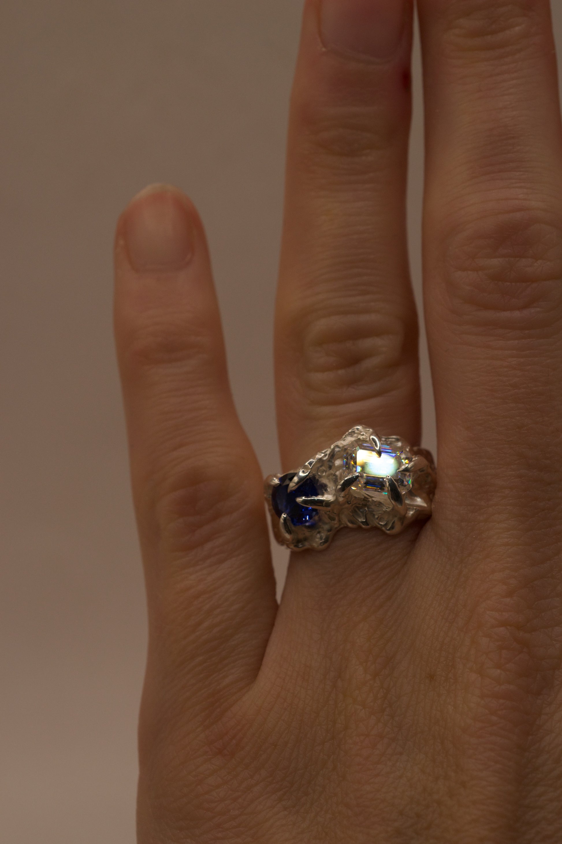 close up image of sterling silver ring on hand