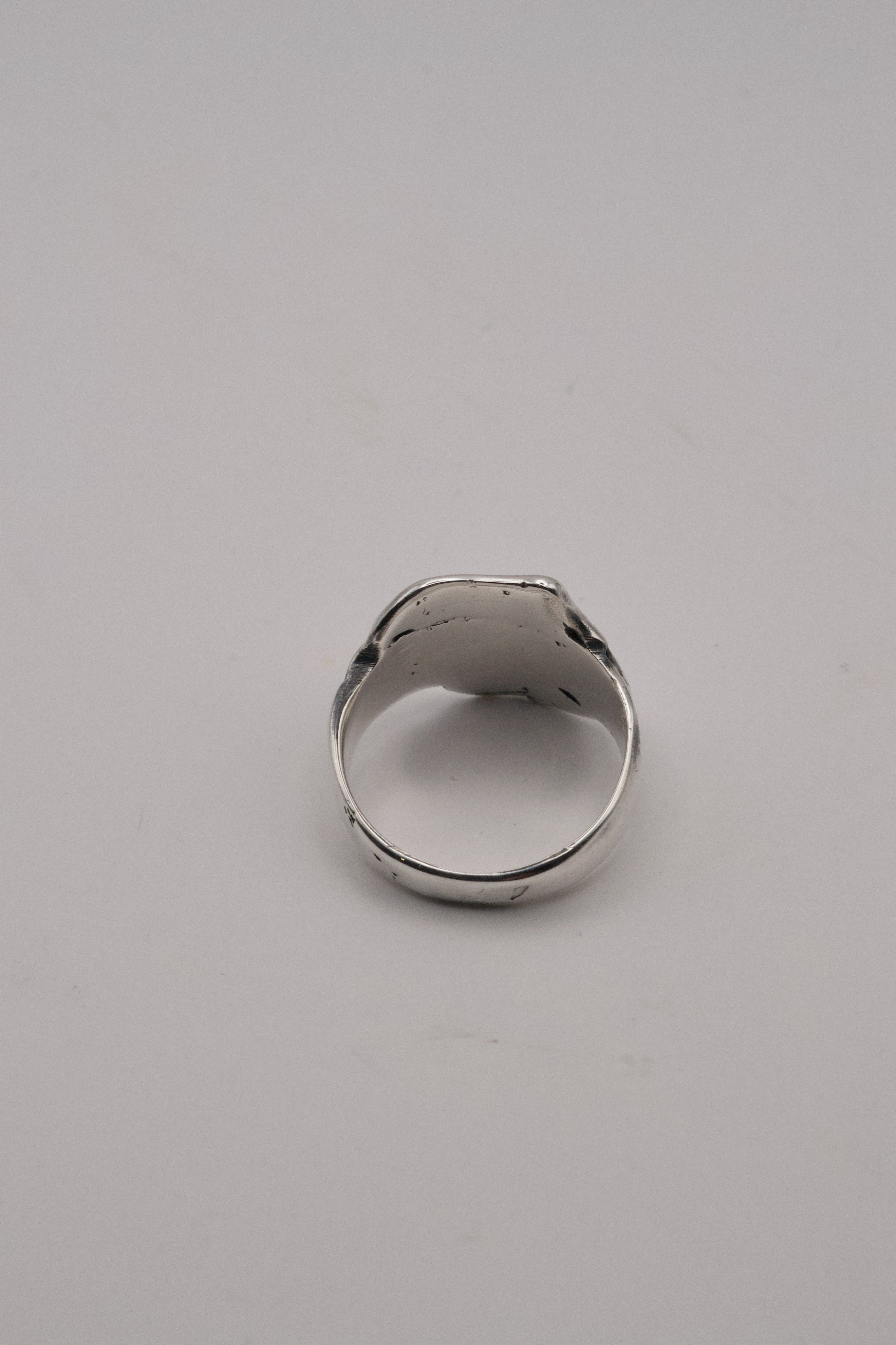 Sculptural alternative silver signet ring Duality design lost wax cast in darkened recycled sterling silver with dimensional organic texture rear view