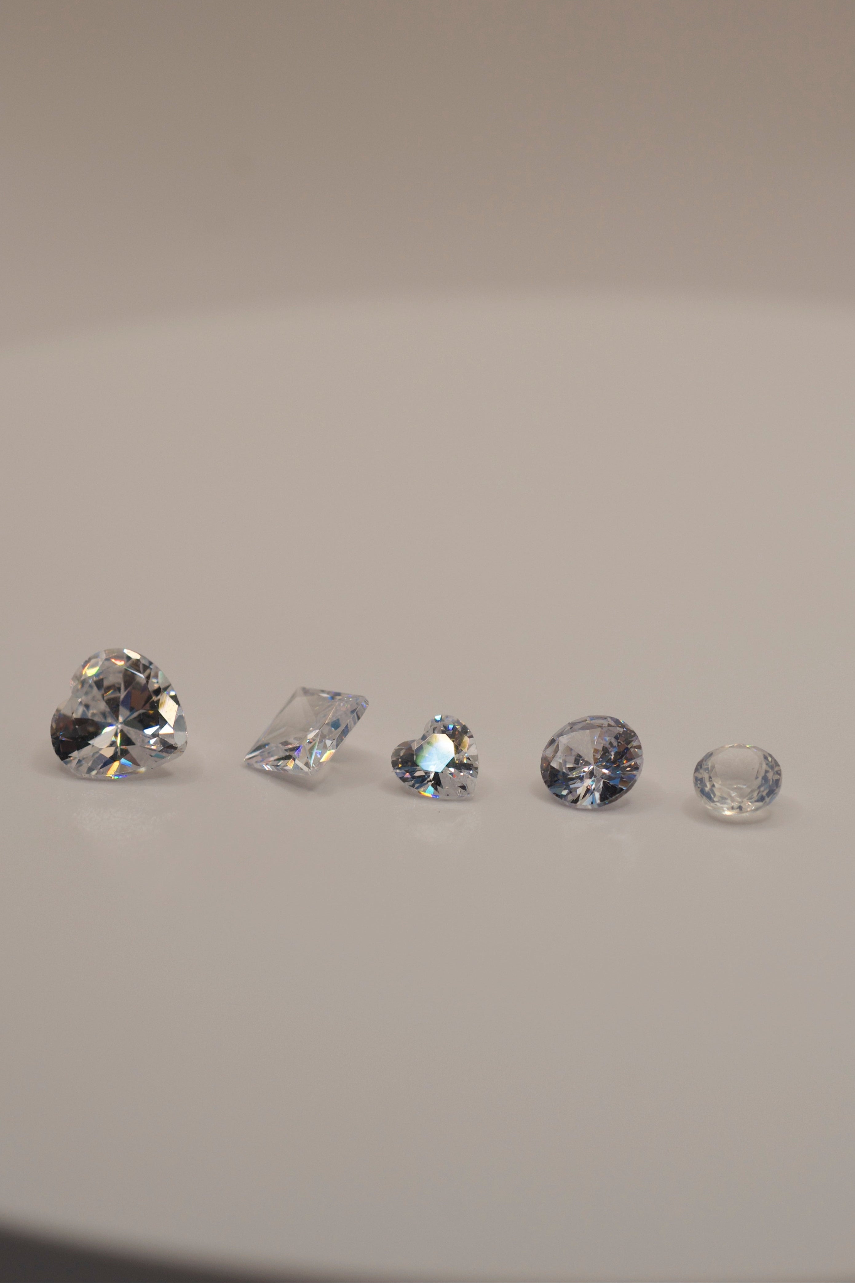 cast in place gemstones, lost wax casting stones, jewellery making gems, cubic zirconia heart, princess cut cz stone, white lab sapphire, nano opal crystal, gemstones for silver casting, heat resistant stones for jewellery, cast in place stone pack.