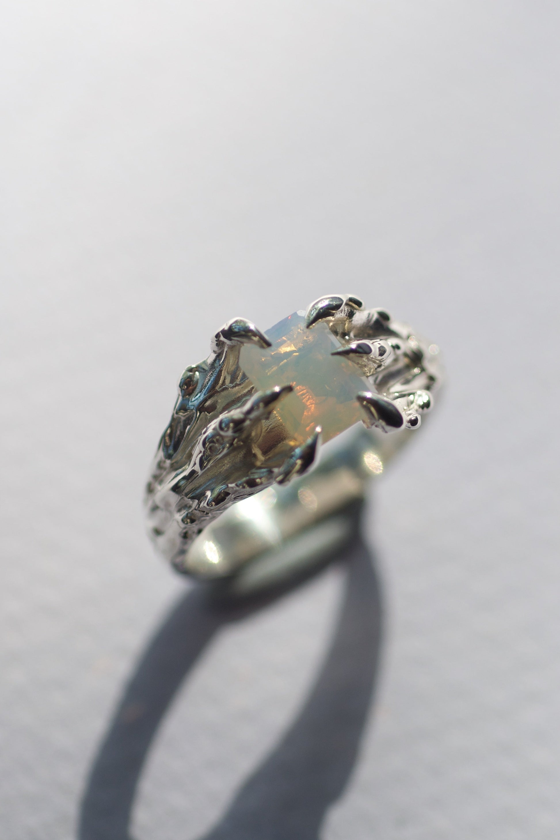 organic textured opal ring with 6 gothic claws