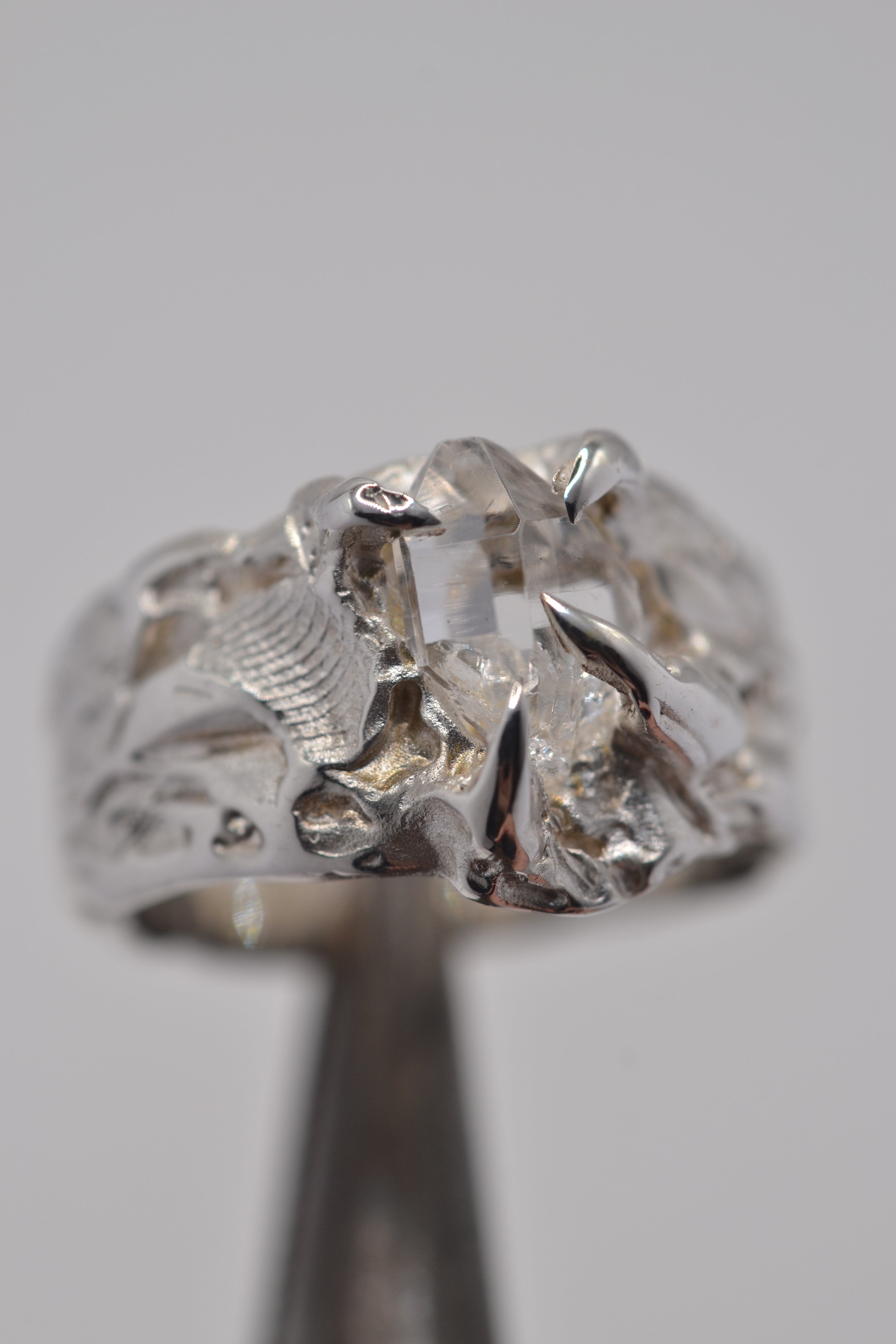 organic handmade ring with crystal and claws by metal bones