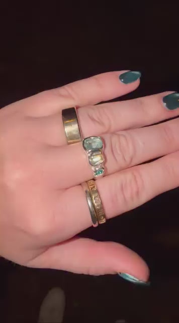 Customer wearing Metal Bones Jewellery rings, handmade silver rings