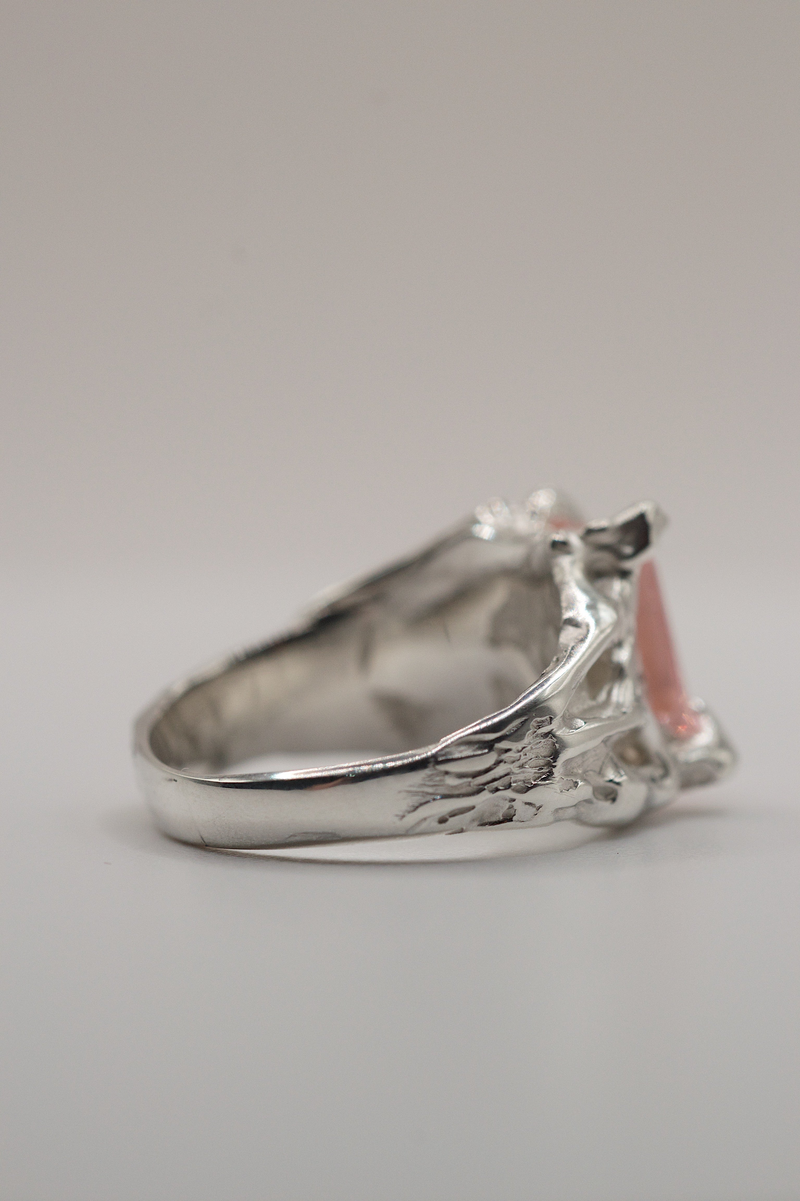 Non traditional engagement ring Rosabelle lost wax cast in sterling silver with pink tourmaline and organic rose petal sculpted band