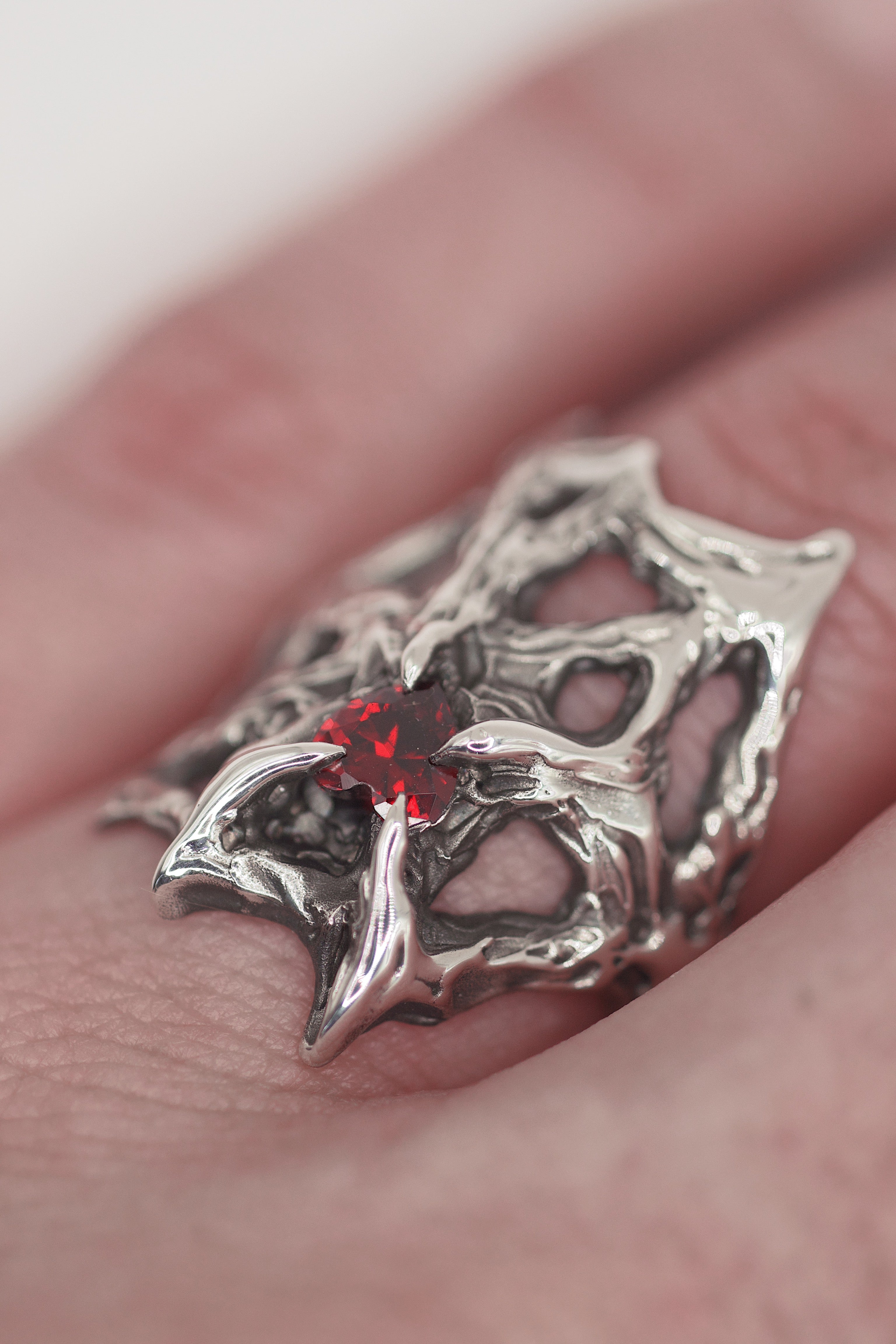 Wearable art gothic silver ring Scarlet design lost wax cast in darkened recycled sterling silver with red garnet heart centre stone