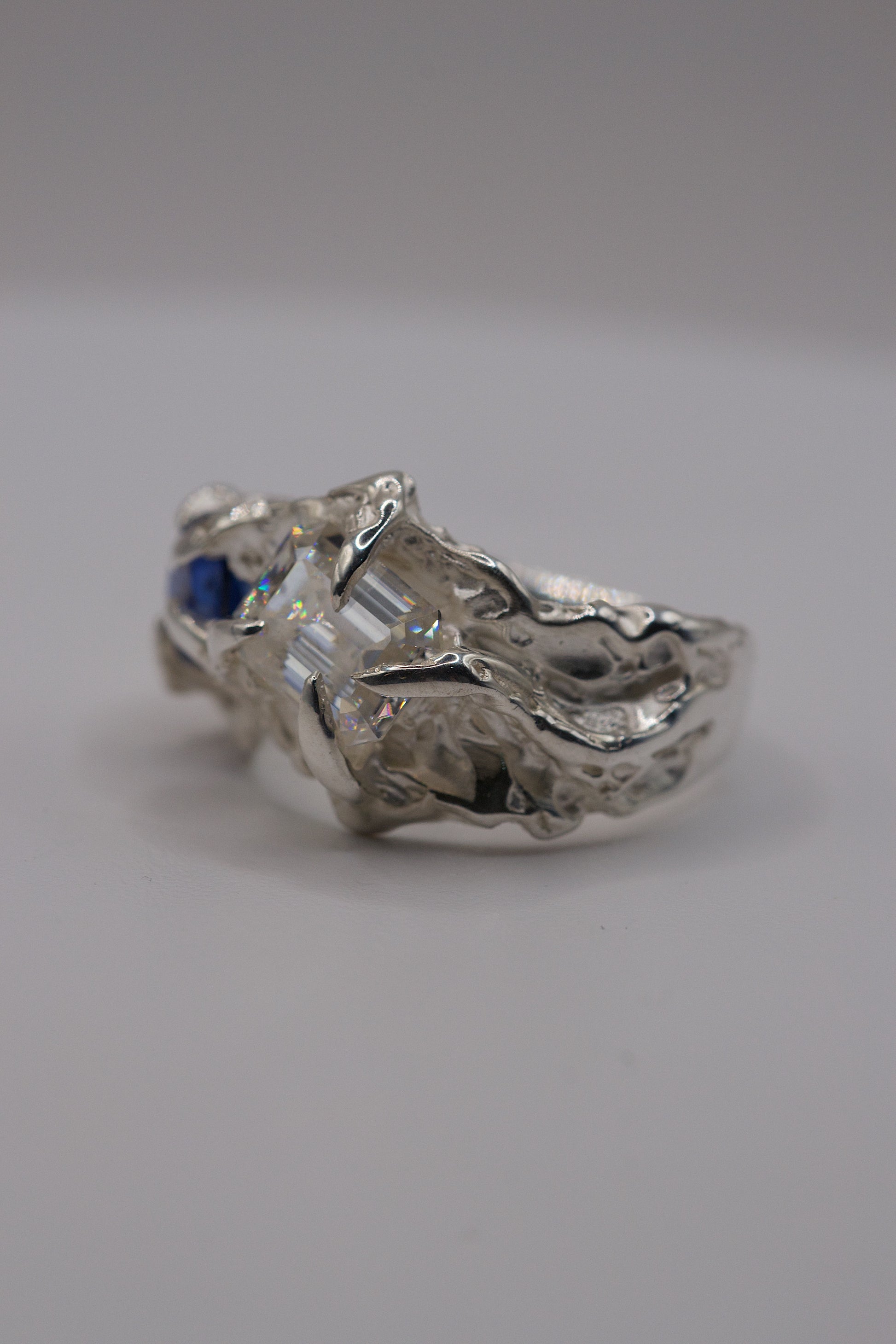 Handmade organic sterling silver heavily textured ring with gothic style claws.