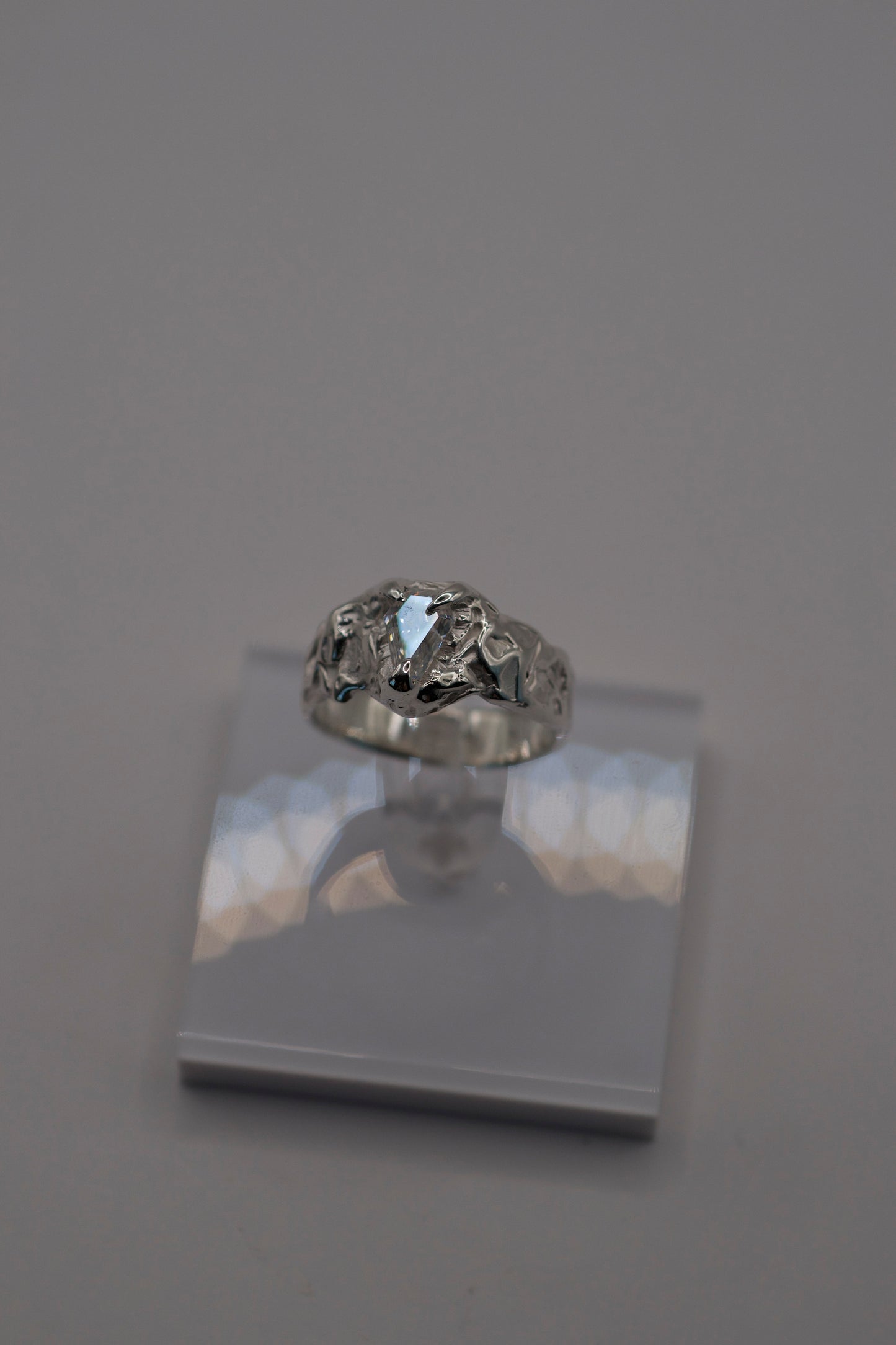 sterling silver ring with coffin moissanite and molten textured band