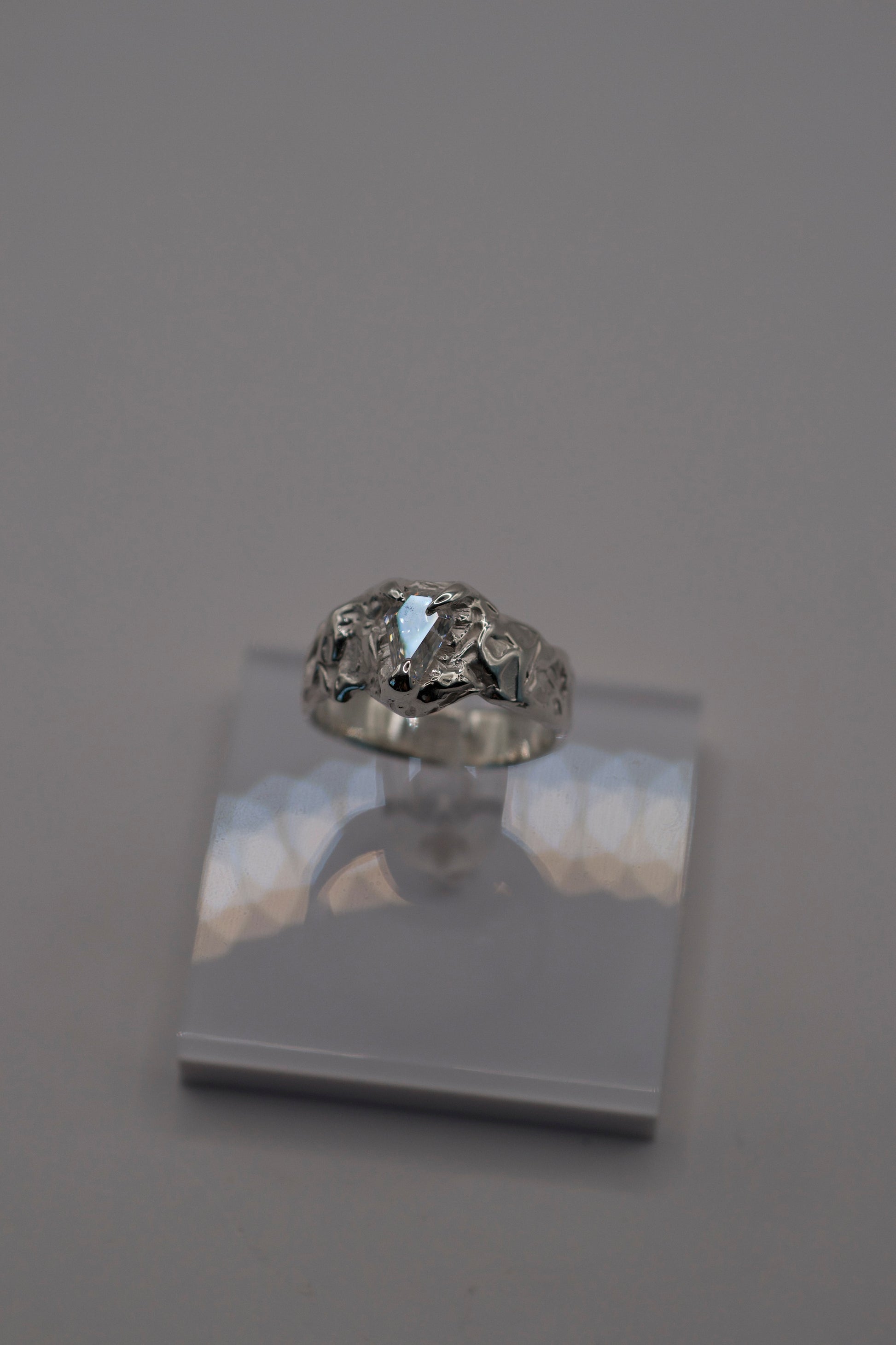 sterling silver ring with coffin moissanite and molten textured band